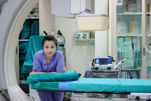 a doctor wearing fluoroscopy protection gear